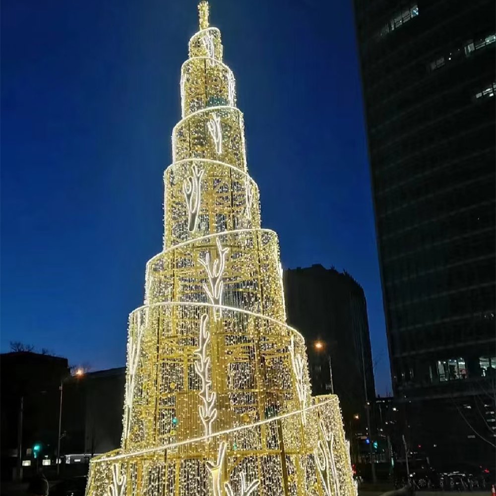 Tall tiered cylindrical light tower with decreasing levels, bright rim outlines and warm-looking vertical lights