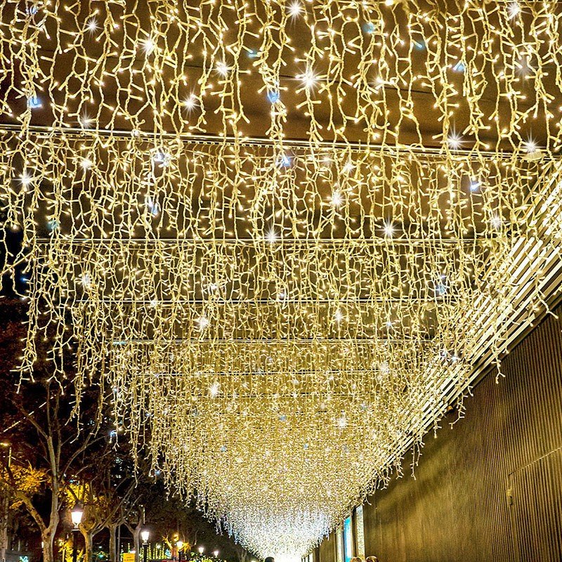 Close view of warm white hanging icicle light strands